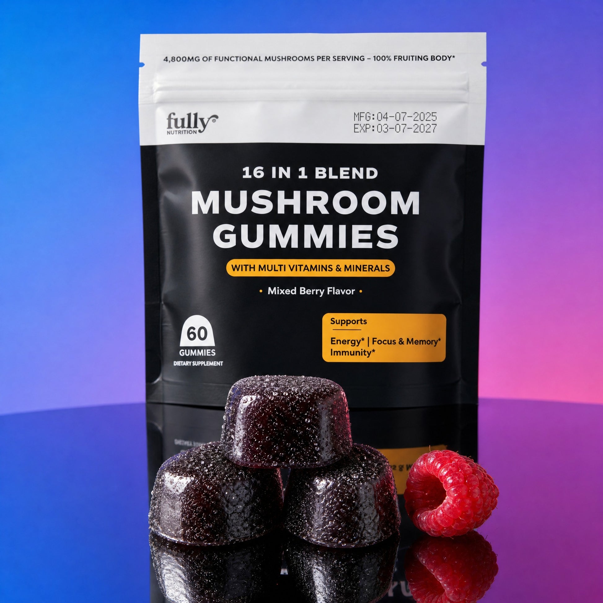 A package of Fully Nutrition 16 in 1 Mushroom Gummies is shown on a reflective surface alongside four dark gummies and a fresh raspberry, set against a blue and purple gradient background.